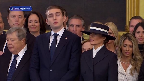 Barron and Melania share sweet embrace at Trump's inauguration