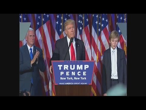 Barron Trump struggles to stay awake during Dad's victory speech