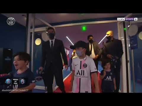 Messi and his Kids on their way to the pitch