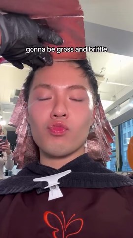 Watch Our Beauty Editor Go From Black to Pink Hair