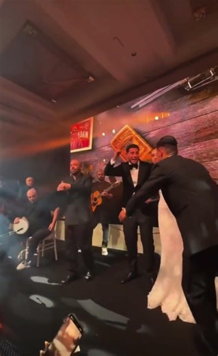 Omer Adam singing at a wedding in Israel