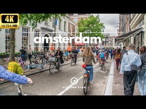 Cycling Through Amsterdam's Streets in 4K - A Magical Experience