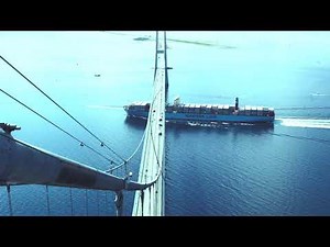 Watch the gigantic containership Triple-E sailing under the Great Belt Bridge | Maersk